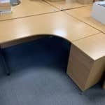 USED 1600 Ergonomic Desks with matching Pedestal in Light Oak – Left and Right Hand available -Quantity available – £125 + VAT EACH