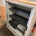 Used Tambour Door Metal Cupboard With Wood Top