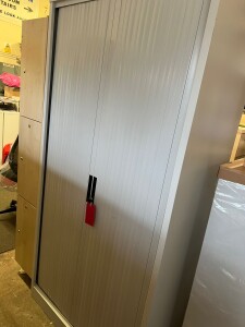 Used metal tambour door cupboards with shelves