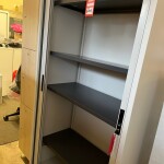 Used metal tambour door cupboards with shelves
