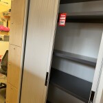 Used metal tambour door cupboards with shelves