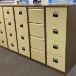 Used metal 4 drawer filing cabinets brown and cream