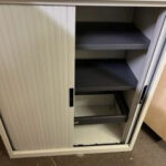 Metal carcass tambour door cupboard with beech top – £199 +vat