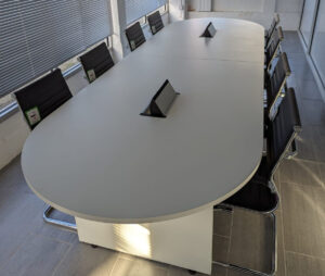 DELUXE MEETING TABLE IN WHITE WITH TWO  INTEGRATED POWER MODULES