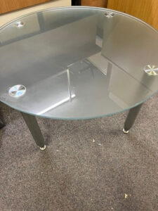 Used round frosted glass top coffee table