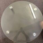 Used round frosted glass top coffee table